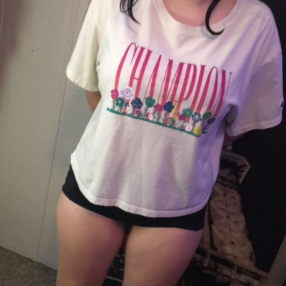 Cute floral champion shirt perfect for any outings very comfortable, very new.